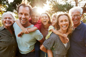 multigenerational family smiling, about lovett dental cinco ranch