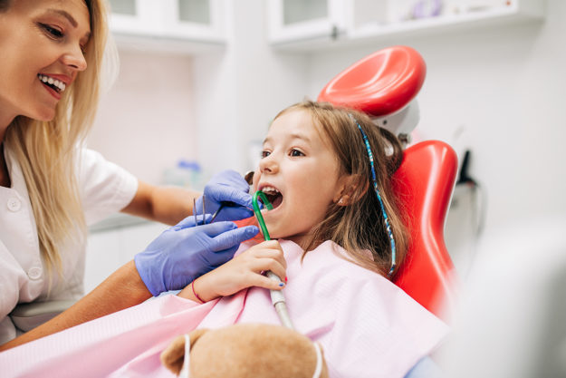 when should a child go to the dentist dentist showing when should a child go to the dentist
