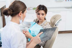 dentist preparing a patient for ridge augmentation