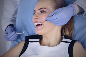 patient getting dental exam